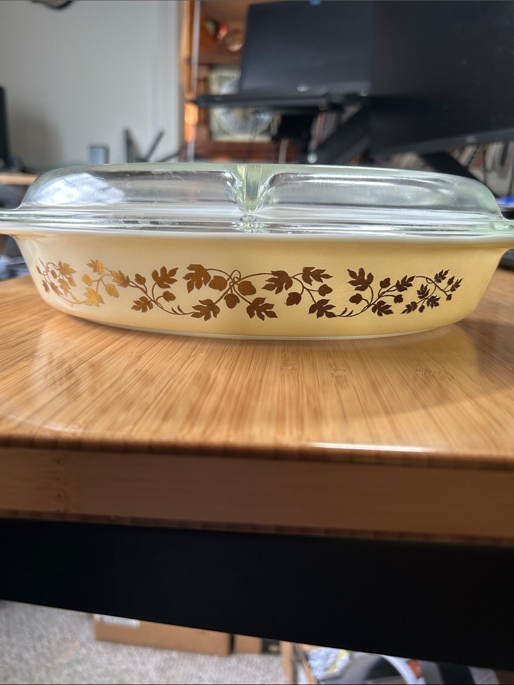 Pyrex Golden Acorn Divided Casserole Dish with its original glass lid